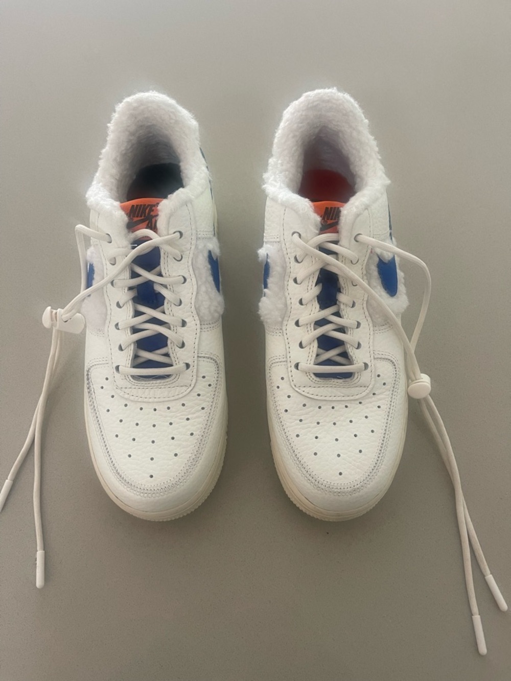 Nike White Sneakers with Blue Swoosh and Sherpa Collar